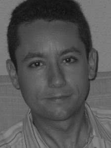 black and white headshot of Manuel López Segura