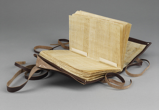Model of a Nag Hammadi Codex, 3rd/4th century AD; Papyrus single-quire text block; Limp leather covers; Papyrus cartonage stiffeners; Parchment tackets for text block attachment