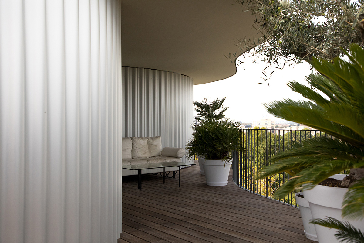 Exterior balcony of La Folie Divine building.