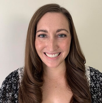 Headshot of Ryanne Hammerl. She is smiling and looking into the camera.