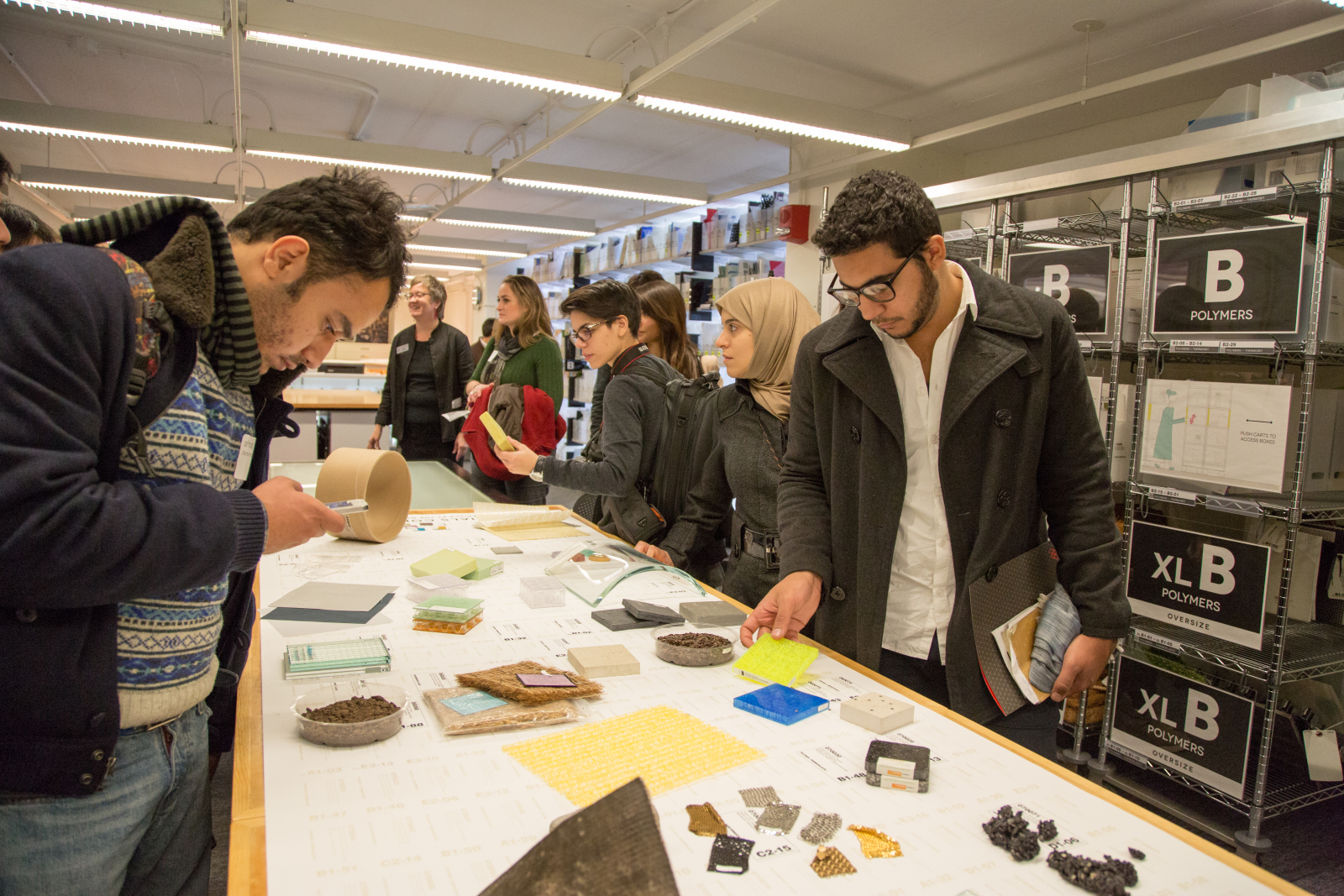 Prospective Students Exploring the Special Materials Collection in Loeb Library