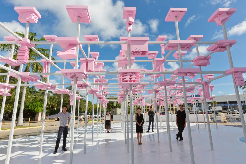 The Unbuilt design team alongside the completed installation