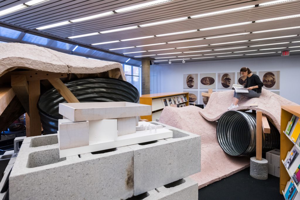 A student sits atop 