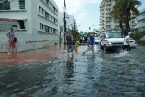 Street flooding in South Beach, April 2013. By siralbertus on Flickr, via Wikimedia Commons.