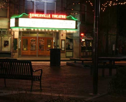 Exterior photo of Somerville Theater at night.