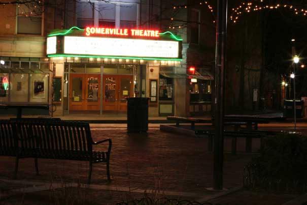 Exterior photo of Somerville Theater at night.