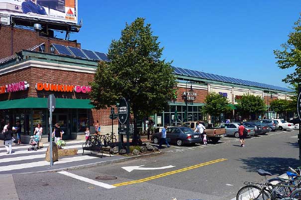 Shops and restaurants line a street in Porter Square.