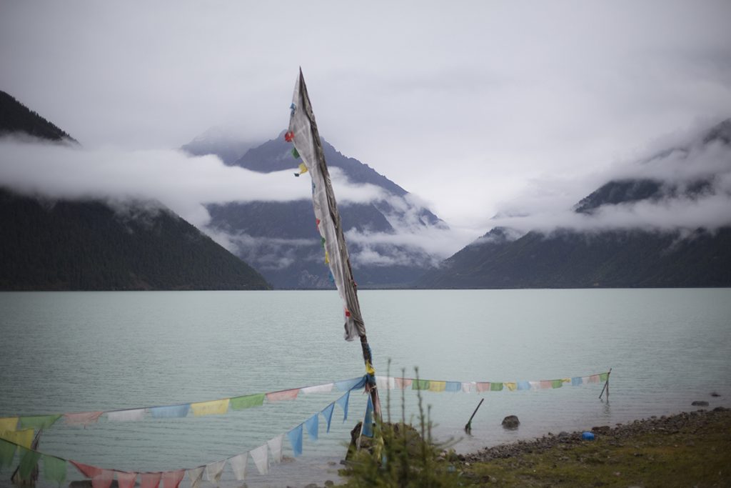 Prayer Flags at the edge of lake Basong Cuo.