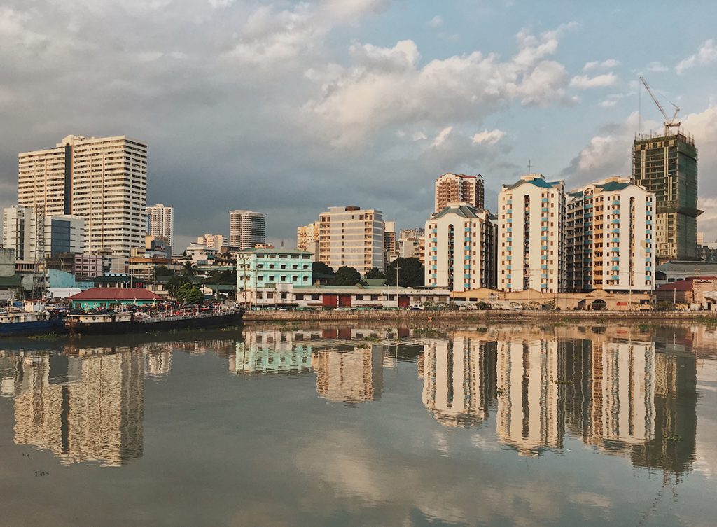 Reflected infrastructures on the banks of the Pasig River remind us of the constant development of Binondo, home of the oldest Chinatown in the world.