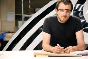 Suleiman Alhadidi sitting at a table with safety glasses on