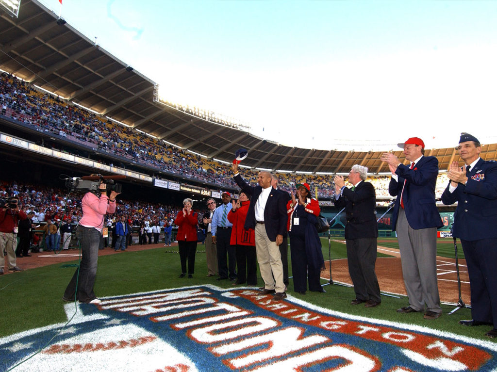 Photo of Anthony A. Williams waving in Nationals Park