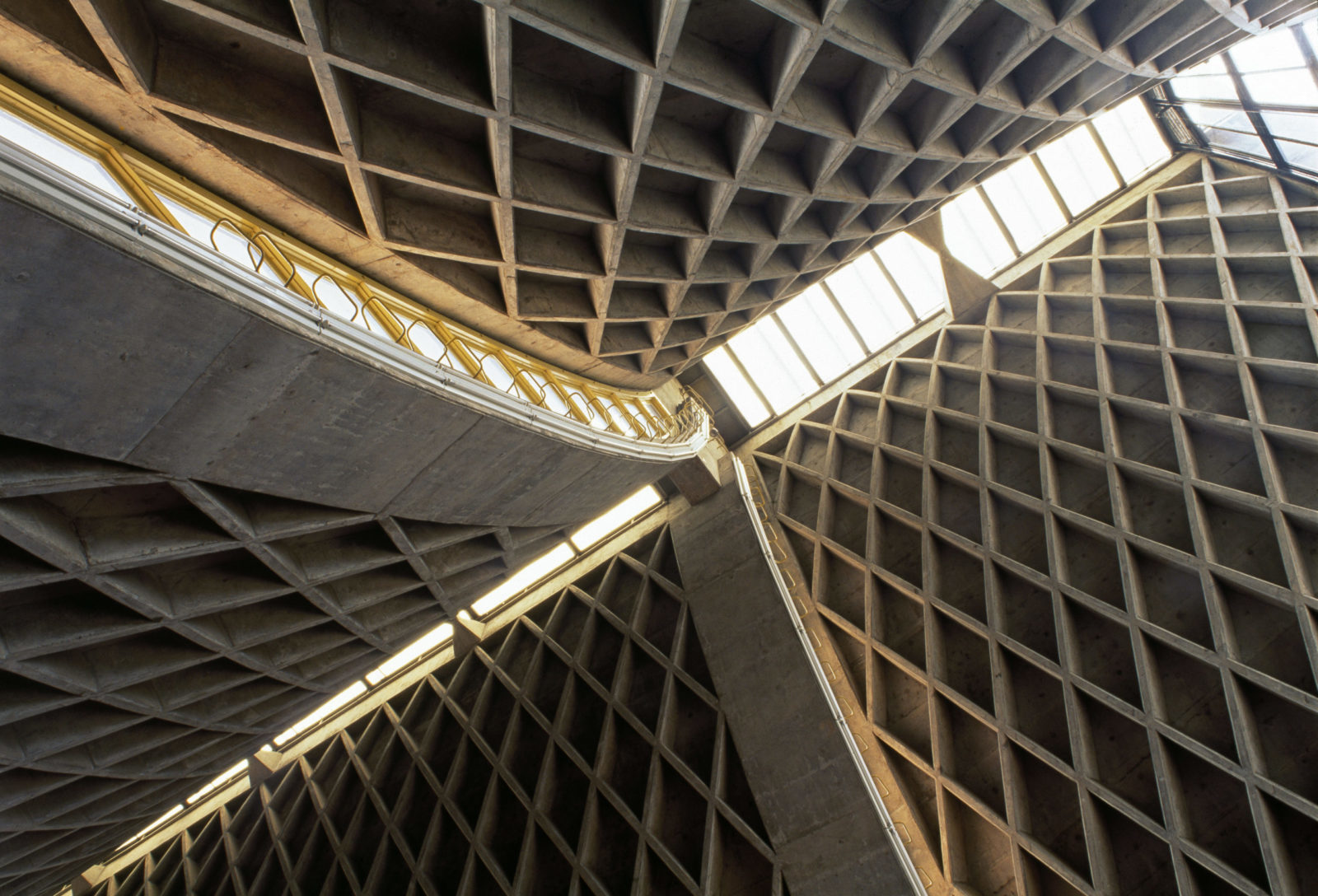 Photograph of geometric sweeping interior of IM Pei's Luce Chapel