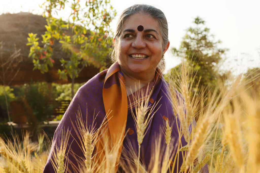 Dr. Shiva standing in a grassy field