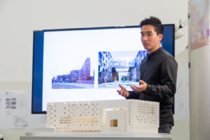 Brian Lee presents his reimagined Miami-Dade County Auditorium during the studio's final review, December 2019