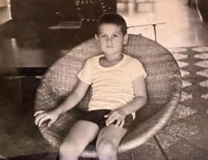 Boy sitting in chair