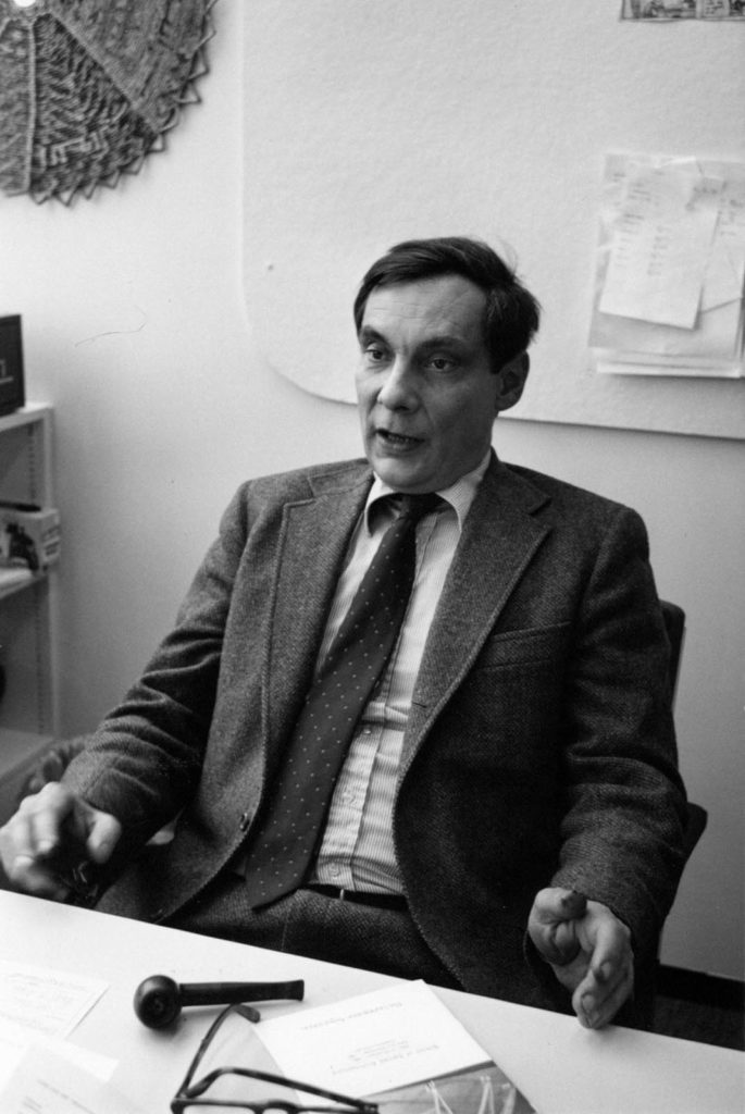 François Vigier sitting at his desk