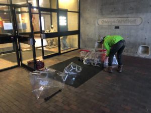 Patient isolation hood (PIH) components being gathered outside Gund Hall for delivery