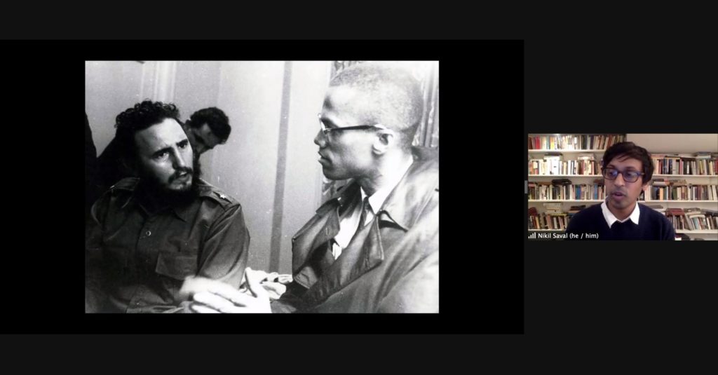 Screenshot of Nikil Saval presenting on Zoom. Saval is visible on the right side of the image. The presentation shows an image of Malcolm X and Fidel Castro in conversation.