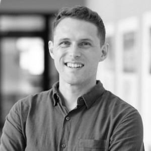 Black and white headshot of Slide Kelly.