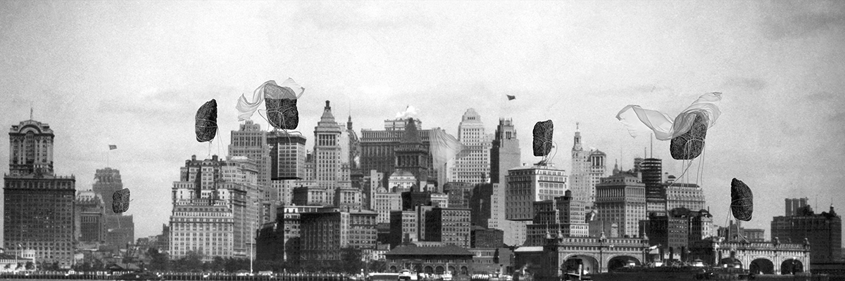 Collage of New York City with rocks floating above buildings