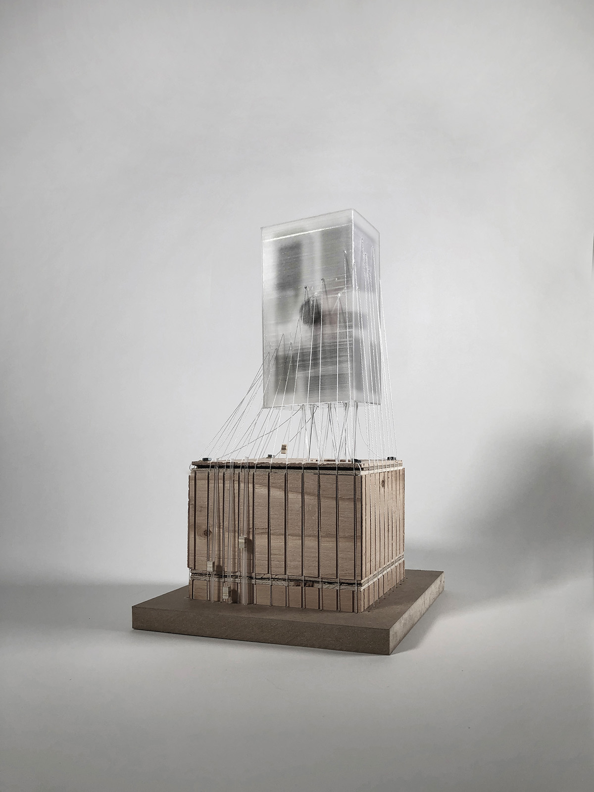 Photograph of building model in front of white background
