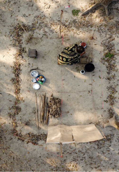 photo from above showing woman crouching down