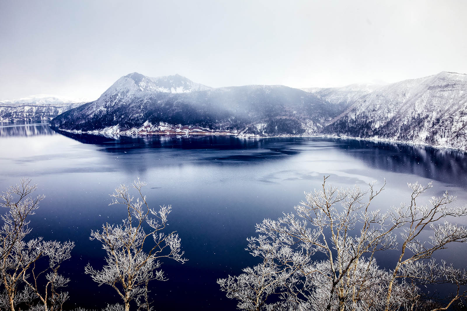 Image of lake in front of mountain at Akan National Park