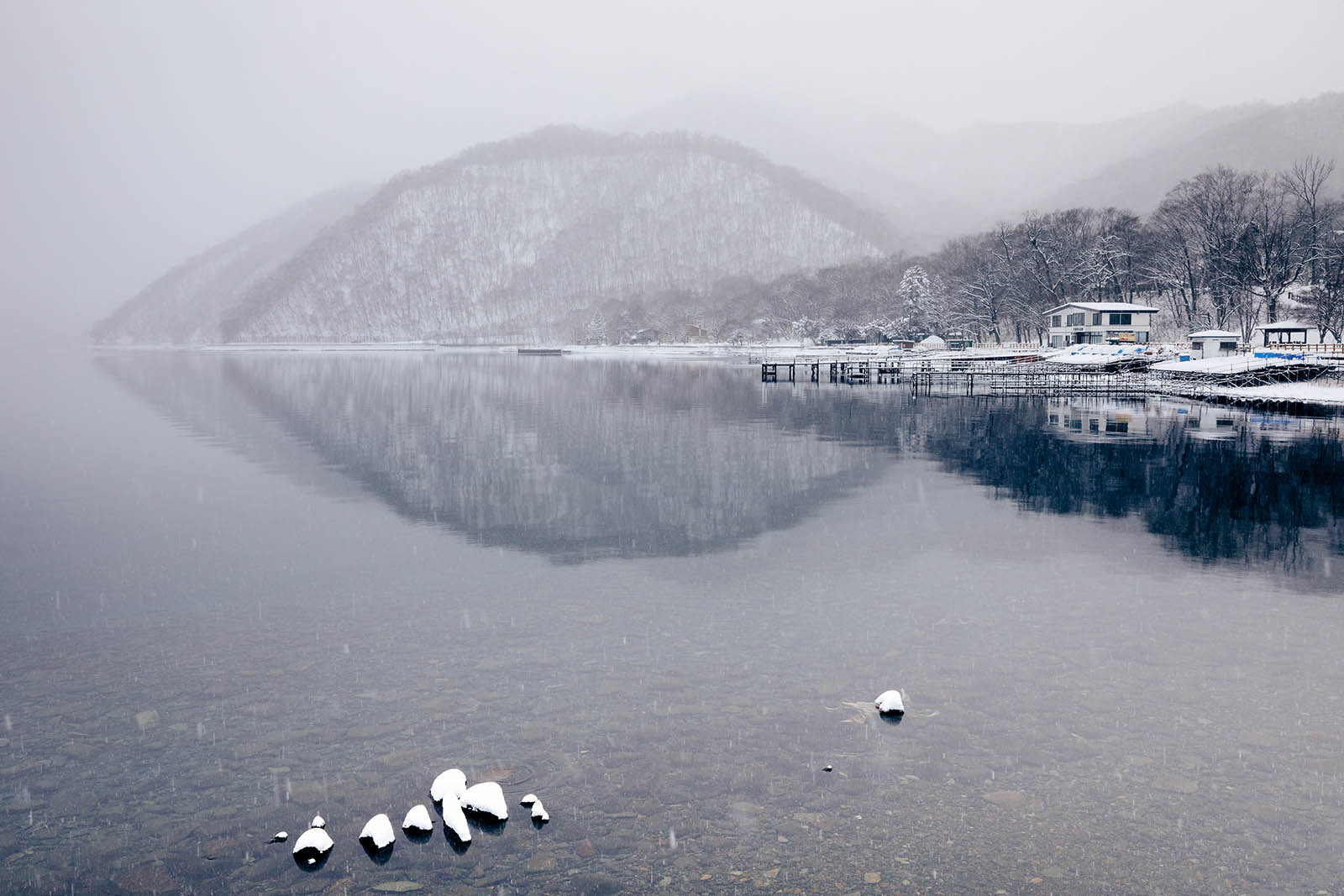 Landscape image of water and Shikotsu-Tōya National Park