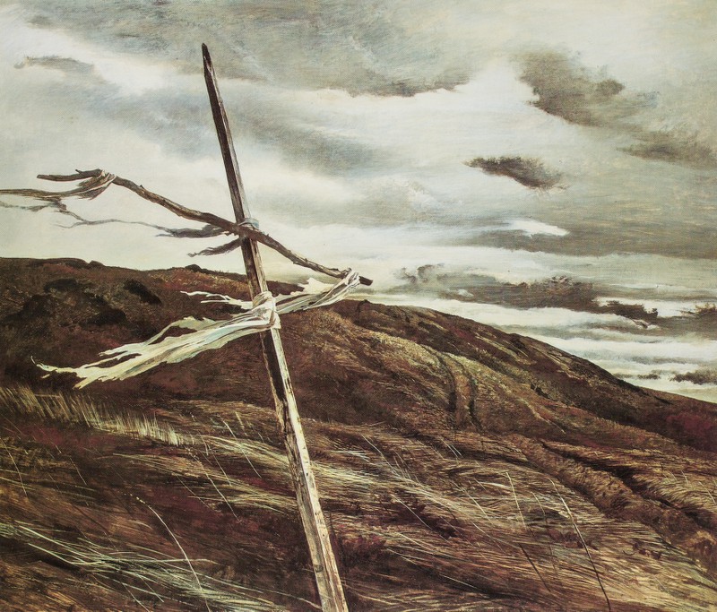 Image of crucifix wood with tattered cloth blowing in the wind