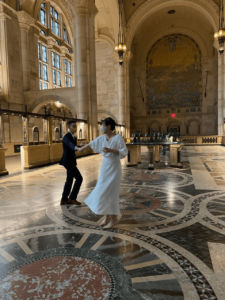 Couple dancing in the Williamsburgh Savings Bank Hall.