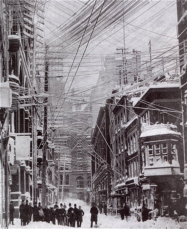 Telephone, telegraph, and power lines over the streets of New York City during the Great Blizzard of 1888.