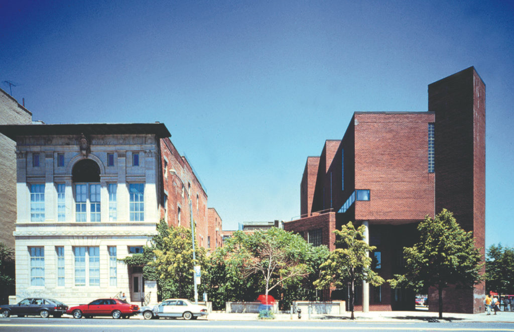 Image of photograph of street view showing elevations of The Schomburg and the Studio Museum