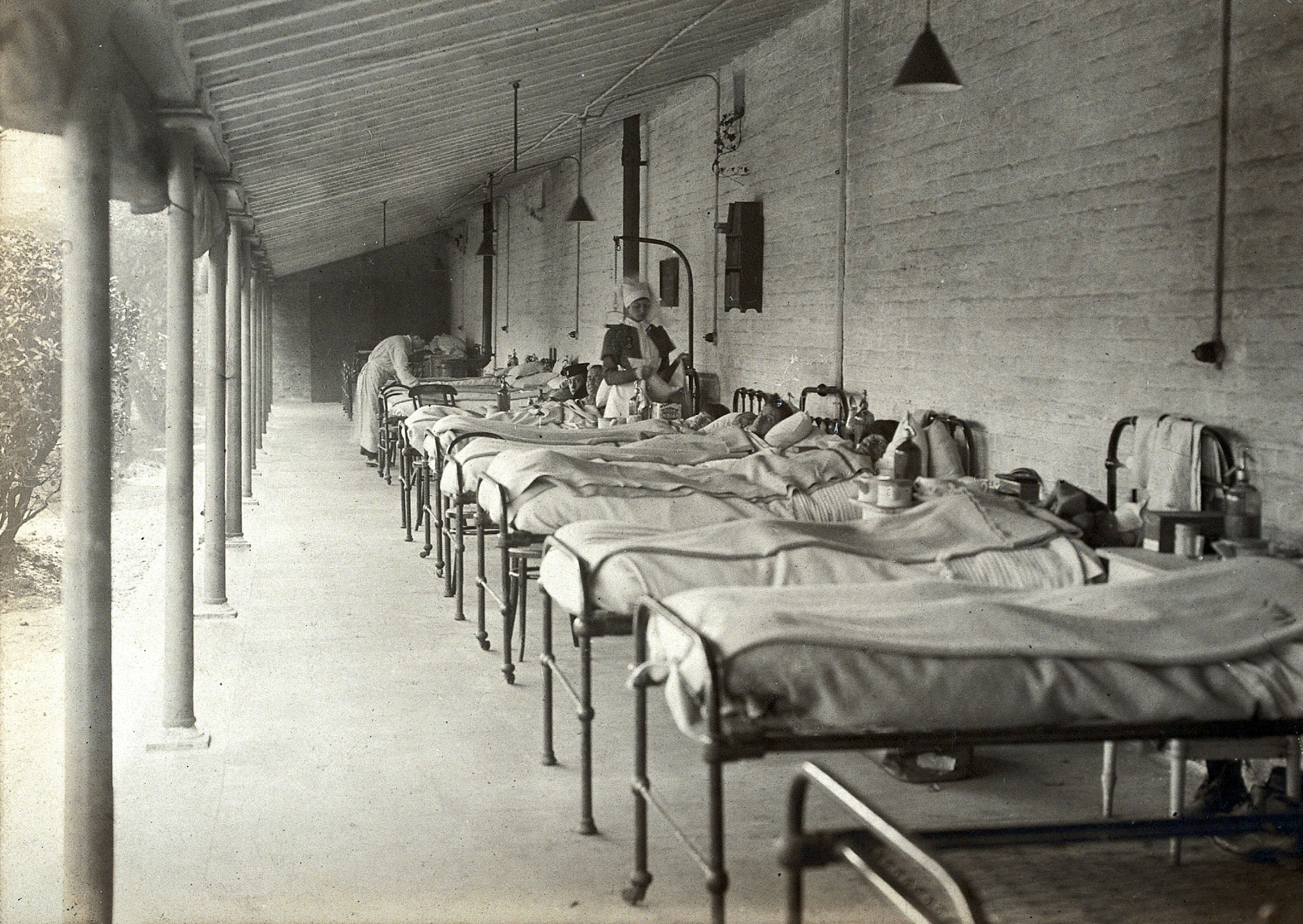 Vintage photograph of hospital beds in terrace