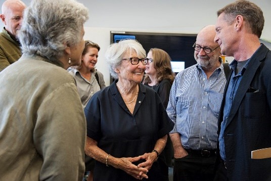 Photo of Cornelia Hahn Oberlander BLA ’47 in a small group