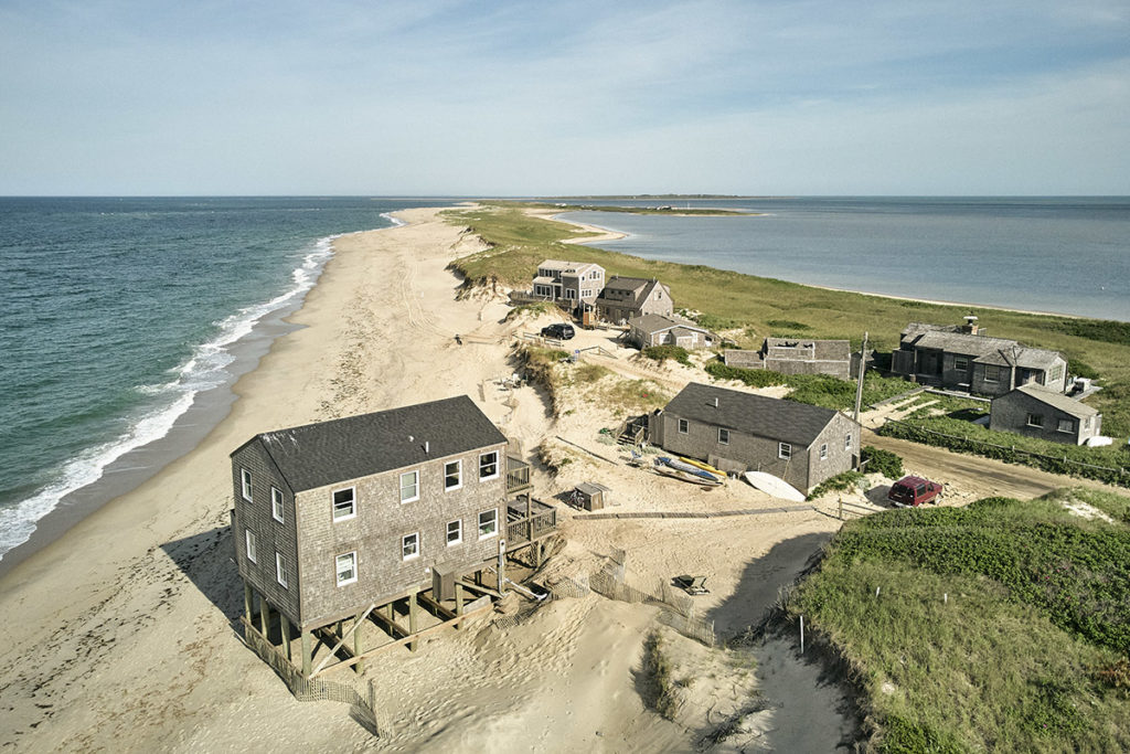 Beach house cabin on the coast of a long and thin island.