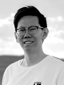 black and white headshot of Xiaoshi Wang