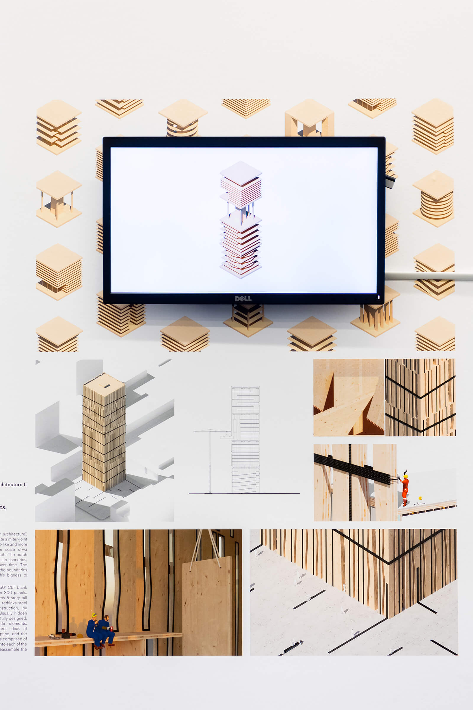 Exhibition wall with drawings of a skyscraper made of CLT and a screen showing an animation of the skyscraper.