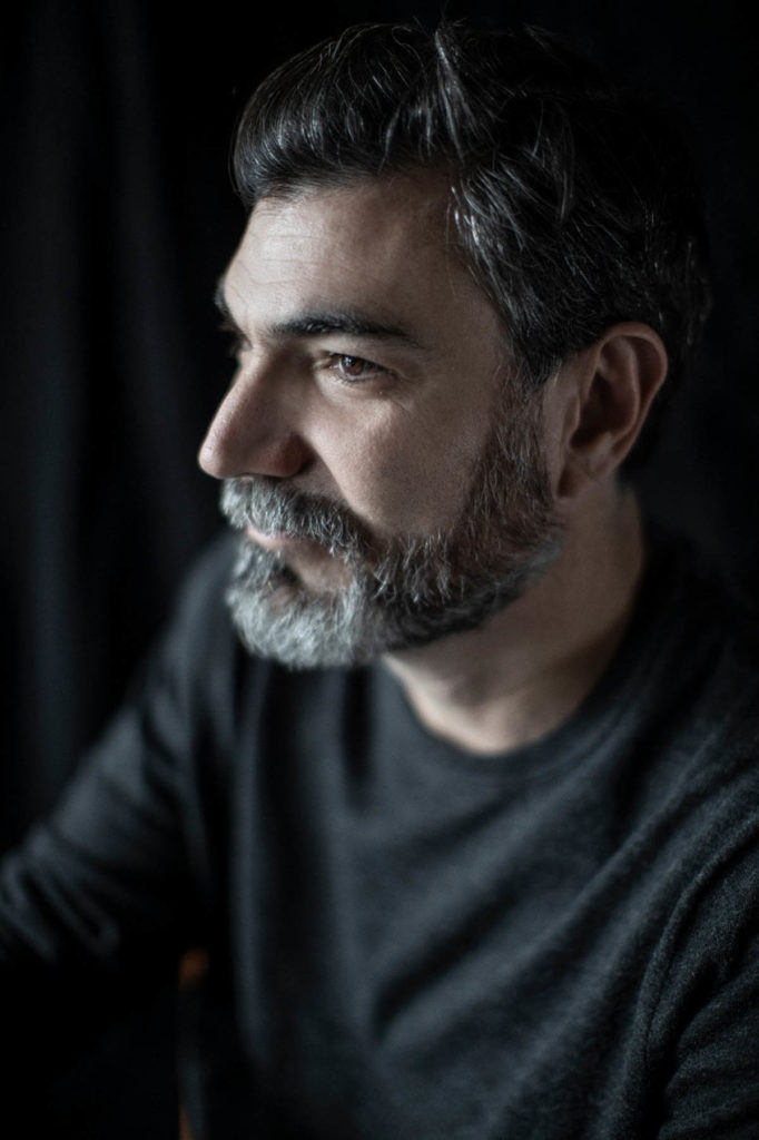 Headshot of Iñaki Echeverria, with a profile view of his face.