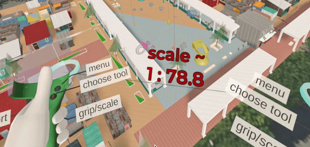A cartoon hand holding a controller in front of a virtual site model.