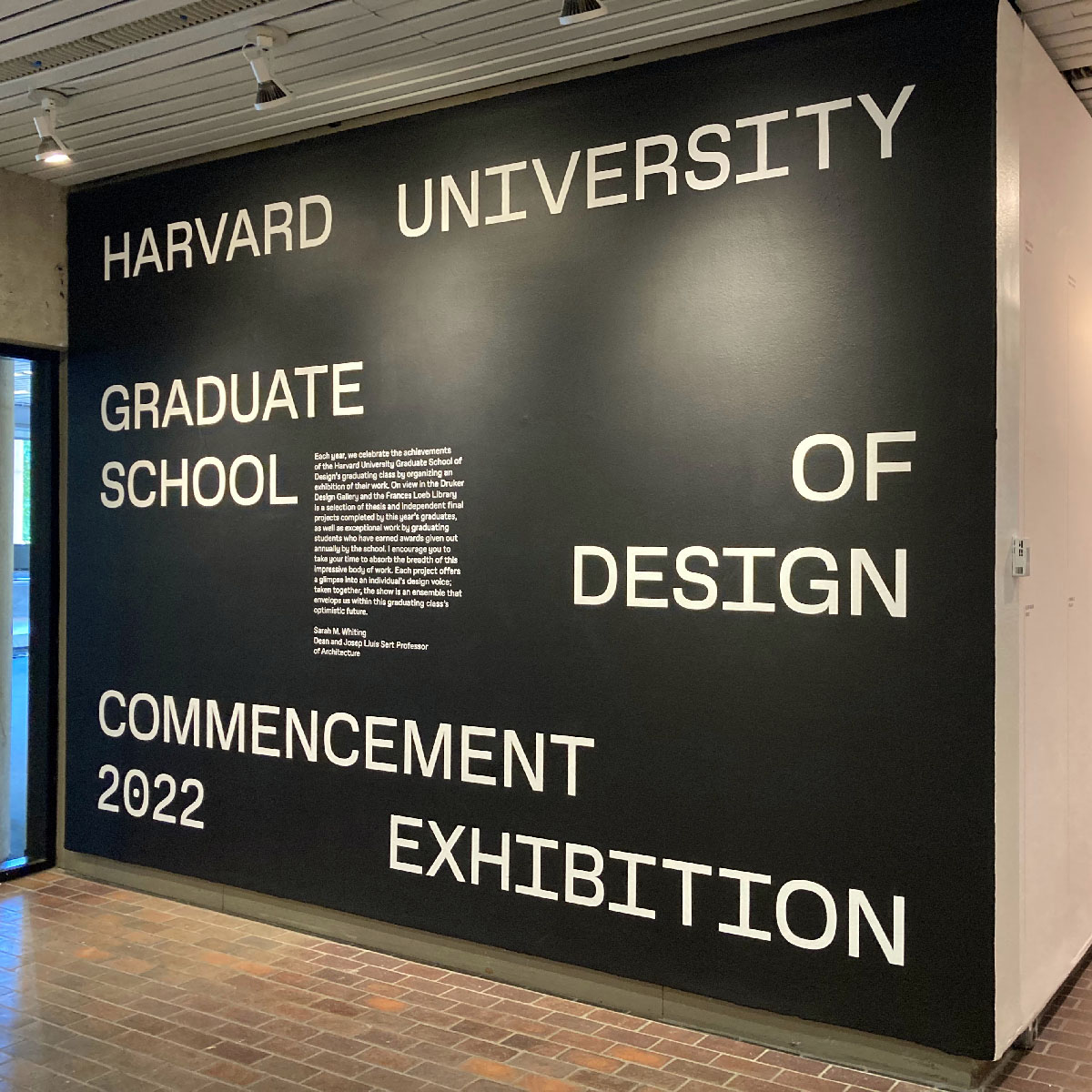 Black painted introduction title wall with white letters