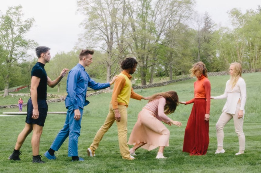 Six dancers in garden