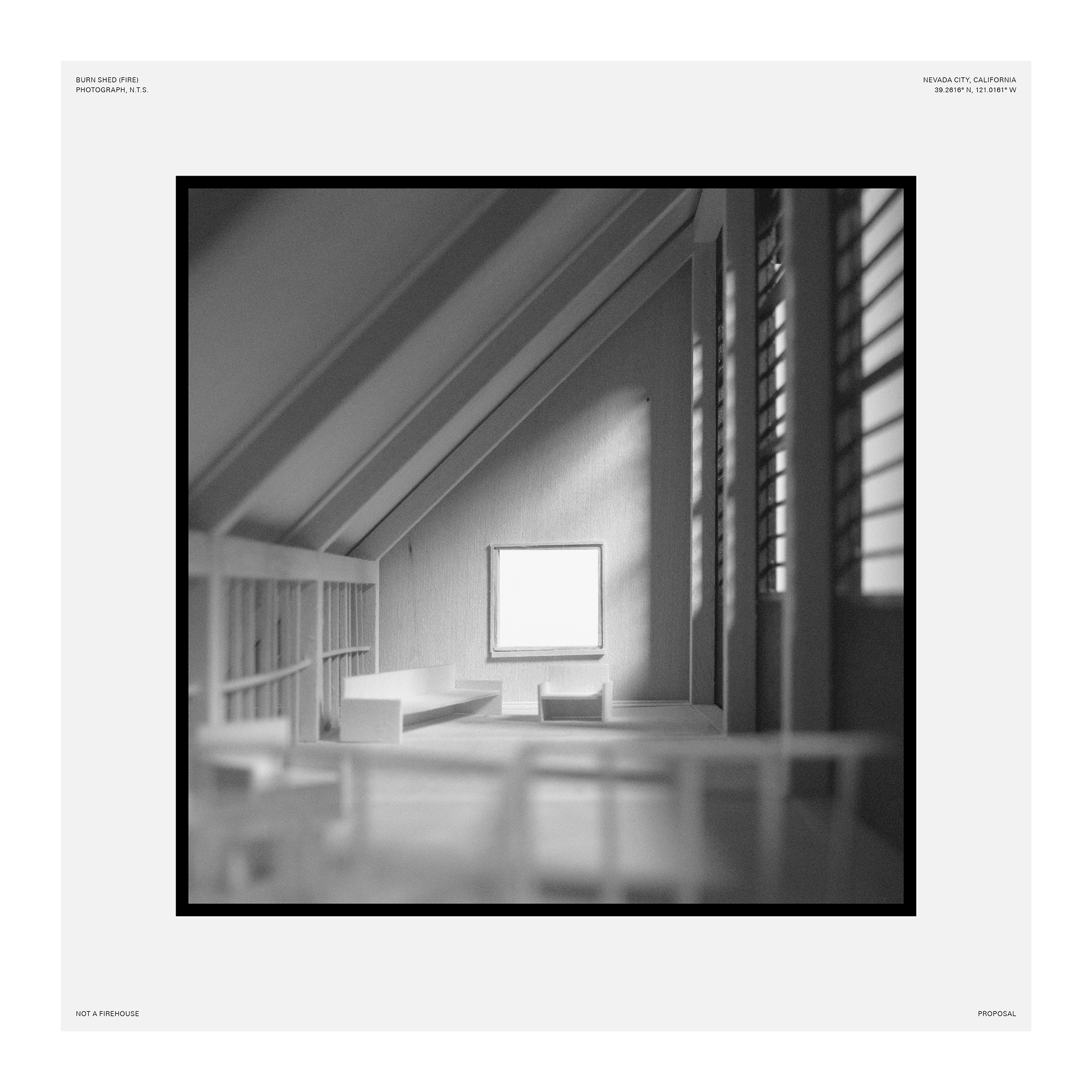Black and white photo of interior of wood architectural model with large square window in background and blurred exposed beams and shadows in foreground.