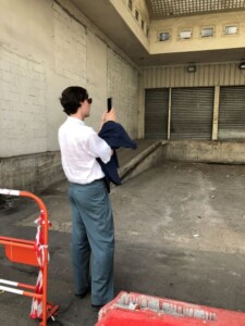Romain David standing in an empty loading bay 