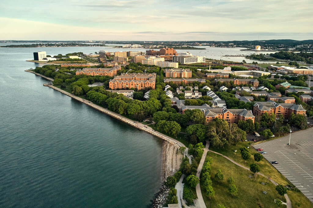 Aerial photo of a peninsula with residential buildings and green space around it