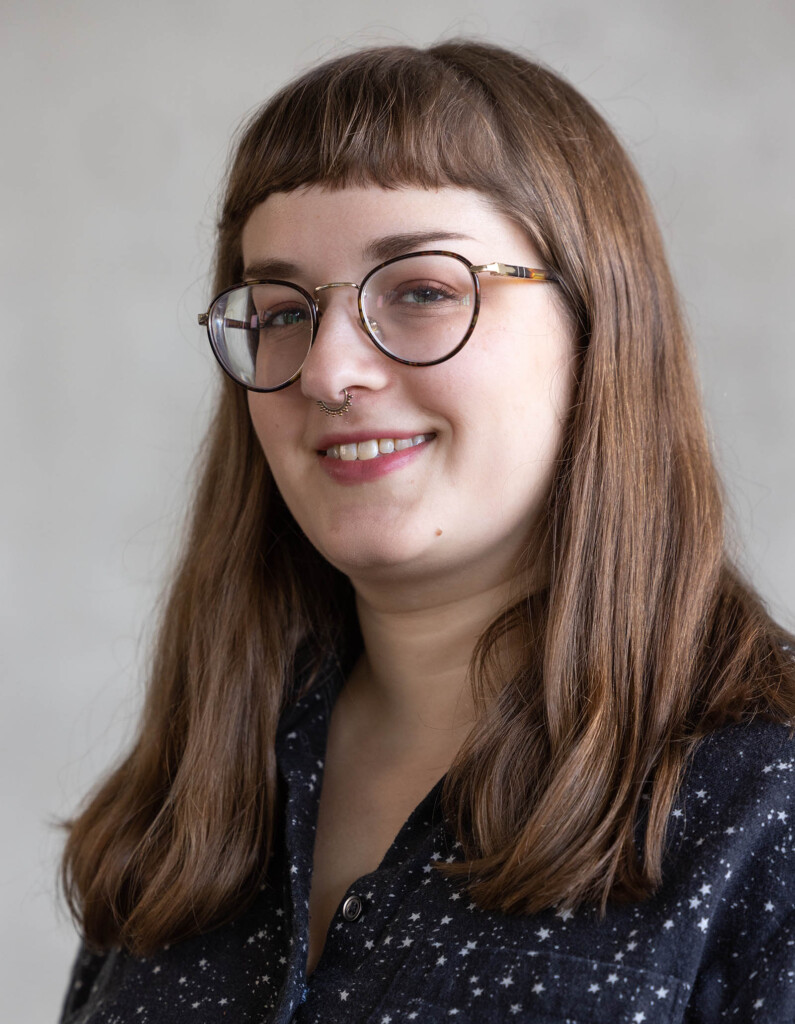 Headshot of a female smiling at the camera