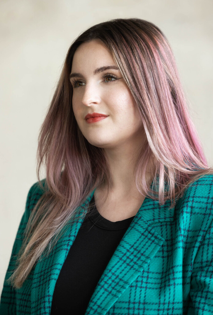 Headshot of a caucasian female looking away from the camera