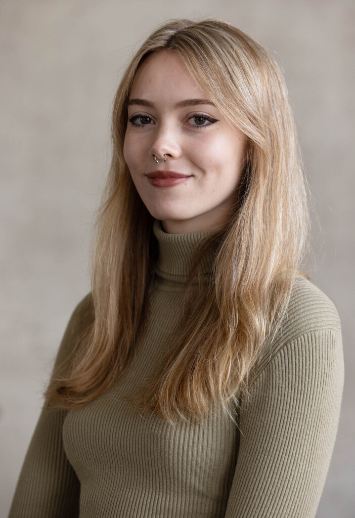 Headshot of a caucasian female smiling at the camera