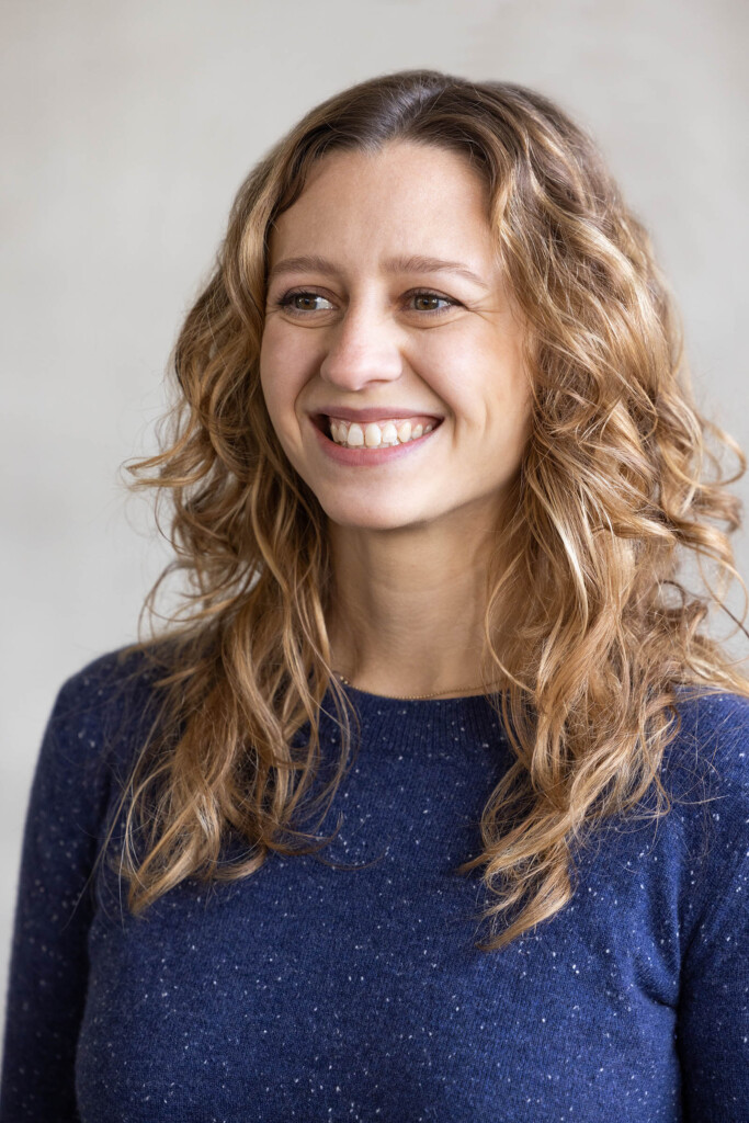 Headshot of a caucasian female looking away from the camera