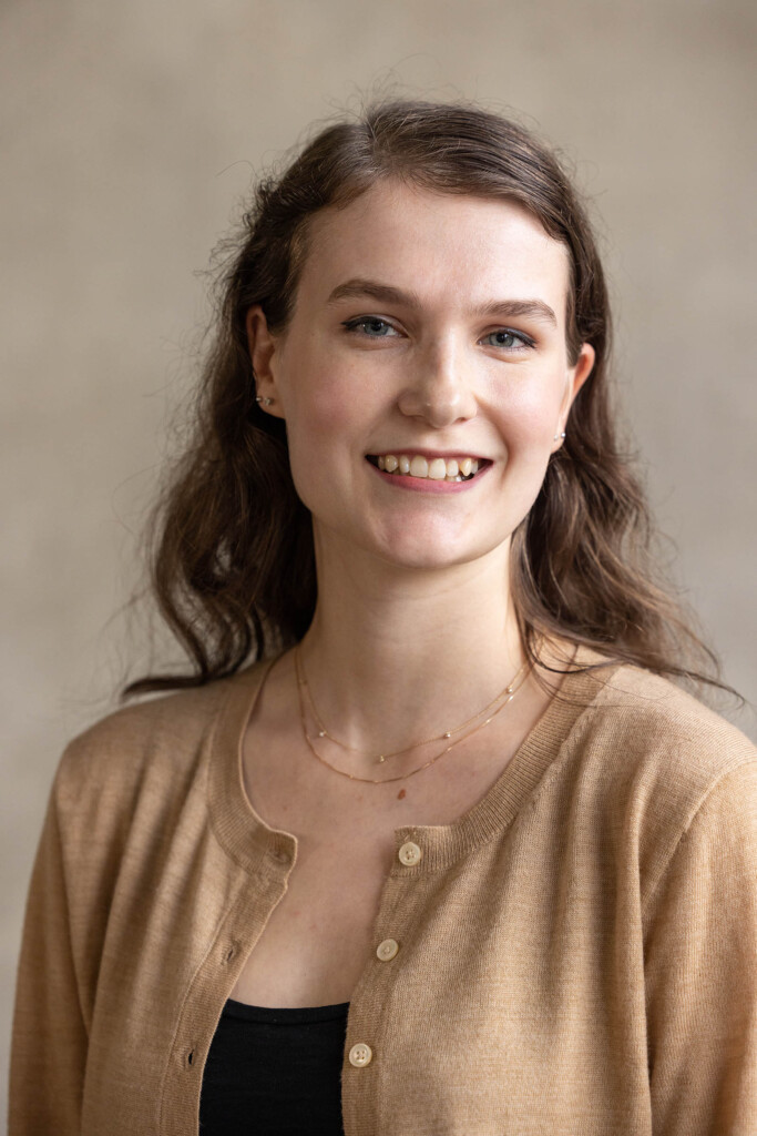 Headshot of a caucasian female smiling at the camera