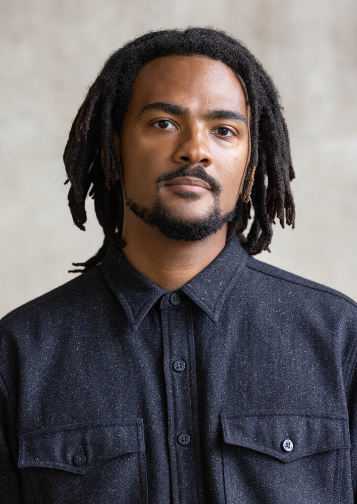 Headshot of an African American male looking at at the camera